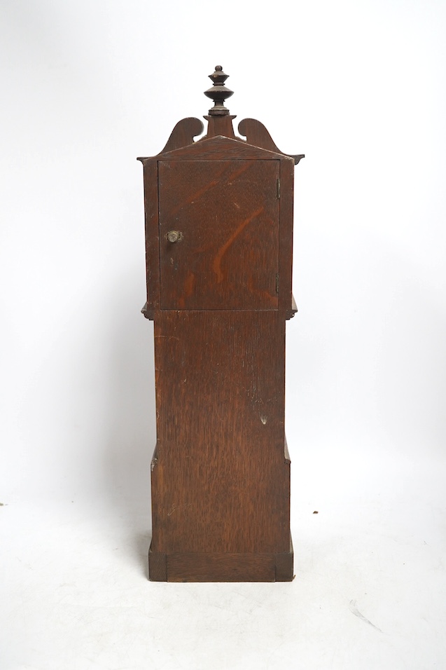 A miniature longcase clock and a miniature yew cylinder musical box, largest 42cm high. Condition - box poor, clock good